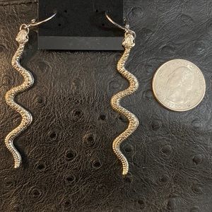 Silver textured snakes on hoops earrings